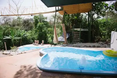 Image de Tarzan Jungle Home - Tyrolienne, piscine, toboggan, climatisation, Wifi rapide!