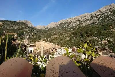 Image de Maison de ville avec terrasse sur le toit et wifi dans le centre de Fornalutx.