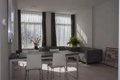 Image de Appartement romantique près des commerces et de la gare de la plage