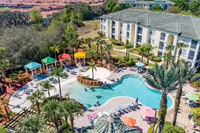 Image de 14-207 Très bien situé à quelques minutes de Disney! Piscine chauffée, gymnase, court de tennis