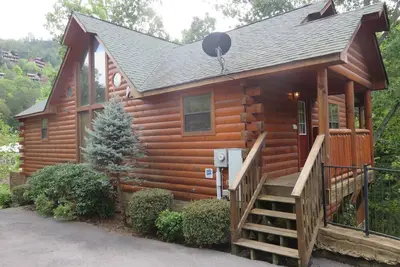 Image de Poolside Paradise bain à remous sauna piscine intérieure jacuzzi salle de jeux mile à Dollywood