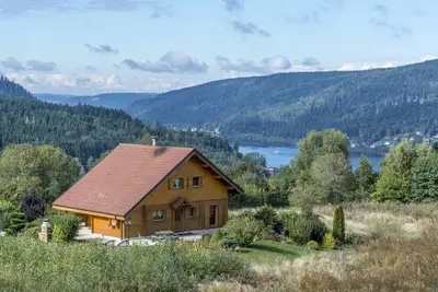 Image de Chalet 14p sauna 8p  grand terrain vue lac Homecinema, 200m pistes 5'centre Wifi