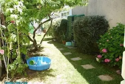 Image de Maison avec jardinet au calme joli coin de verdure 3mn du centre ville