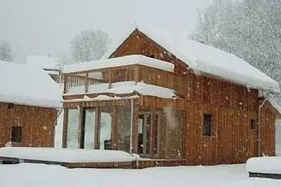 Image de Location de vacances de ski Chalet avec sauna, bain jaccuzi et WiFi