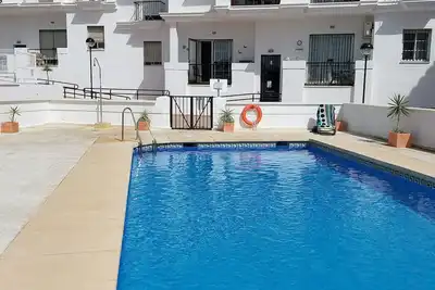 Image de Cet appartement est au centre du village et dispose d'un balcon orienté au sud