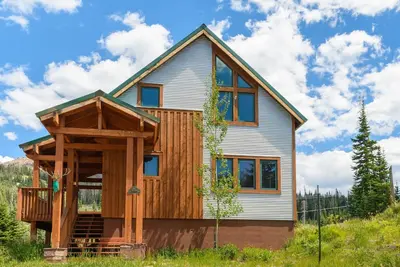 Image de Cabine confortable avec grande terrasse et vue imprenable! Détendez-vous dans votre baignoire à jet surdimensionnée après une journée