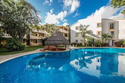 Image de Condo le plus proche du Beach Club, spacieux, élégant, service de nettoyage inclus
