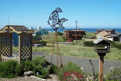 Image de Jardin clôturé avec sirène Moonstruck Animaux acceptés Vue sur l'océan Jacuzzi Câble Wifi