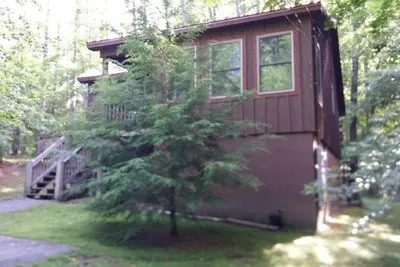 Image de The Magnolia (Smokey Mtn Cabin avec bain à remous)