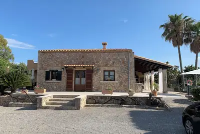 Image de Villa Can Tomi maison de ferme au calme, parking privé, wifi, jardins.