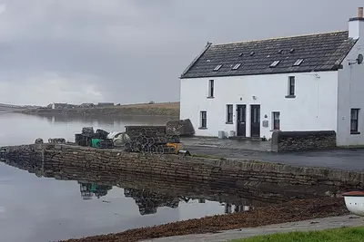 Image de 1 chambre Waterside Cottage Ă St Margarets Hope Orkney peut accueillir jusqu'Ă 4
