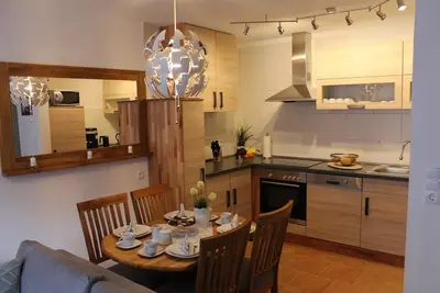 Image de Les vacances commencent là où vous vous sentirez comme à la maison dans le 4 **** Ferienbungalow Bergblüte