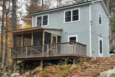 Image de Cozy Haven: un chalet au bord du lac près de l'Acadie