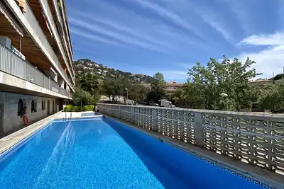 Image de Appartement de vacances Lloret De Mar avec vue sur la mer et la piscine