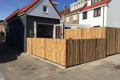 Image de Happy House par la mer, à 100 mètres de la plage, avec un parking privé!