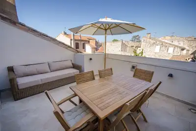 Image de Maison de village au coeur du Centre Historique avec toit terrasse et garage.