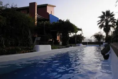 Image de Terrasse avec vue sur le canal Teide Wifi + barbecue sauna piscine chauffée jardin