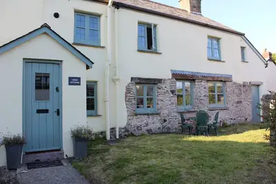 Image de Cottage de 400 ans est dans le charmant village du nord du Devon de West Down