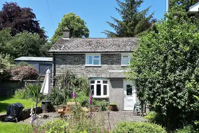 Image de Gwardolau Cottage, chien amical.