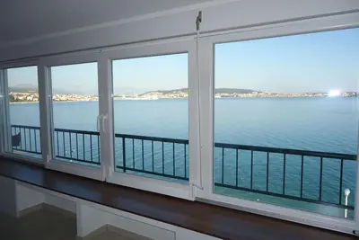 Image de La maison de famille est d'abord par la mer a sa propre porte à la plage!