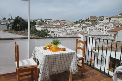 Image de Maison de ville avec piscine commune et terrasse privée sur le toit plus Wifi