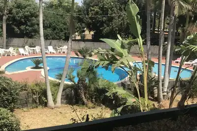 Image de Capomulini villa avec jardin privé, accès à la mer et la saison de la piscine.