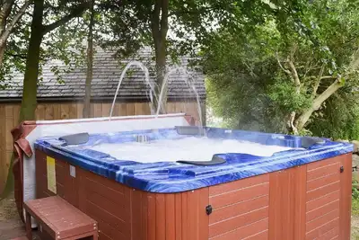 Image de Chalet de luxe 5 * avec bain à remous \/ sauna \/ Wifi \/ Sky, jardin clos et animaux acceptés