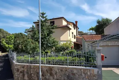 Image de Appartement à 400 mètres de la mer, WiFi, parking.
