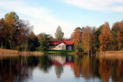 Image de Maison de vacances Suède au bord du lac Bolmen avec sauna, cheminée et bateau