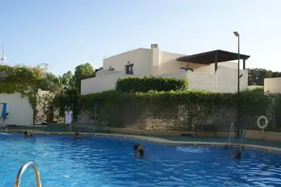 Image de Villa, avec piscine dans résidence fermée très proche de la plage et de la ville