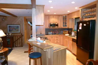 Image de Famille Et Pet Friendly Riverside Mountain Retreat