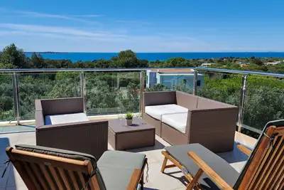 Image de Penthouse avec vue mer gratuite, à 300m de la plage, WiFi et télévision allemande