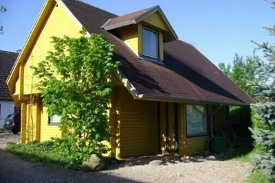 Image de Vacances avec un chien dans une maison de vacances avec jardin clôturé sur la mer Baltique