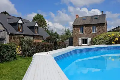 Image de Ferme et GÎTE Normandie avec Piscine - Capacité jusqu'à 10 personnes.