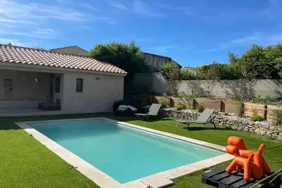 Image de Modern 110m2 air-conditioned house with garden and private heated pool.