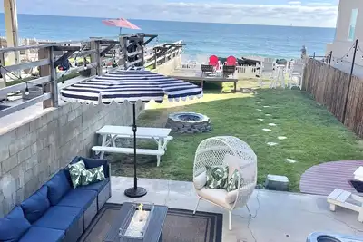 Image de Logement entier en bord de mer avec Spa et grand jardin privé! ! !