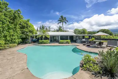 Image de Pahukoa Hale - Maison de style hawaïen au bord de l'océan, située à Kona Bay Estates.