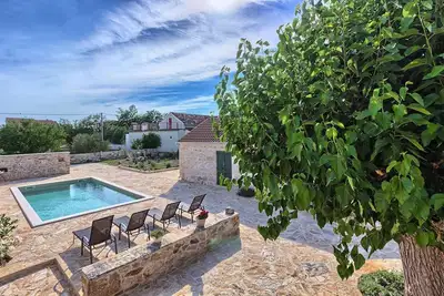 Image de Maison de vacances Oliva - avec piscine privée et à 10 minutes de la plage