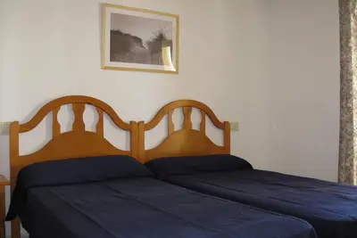Image de Apartamentos la Reina