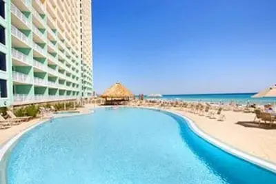 Image de Propriétaire entretenu. . . 2 Bd \/ 2 Bth Beach Front Condo de luxe avec balcon privé