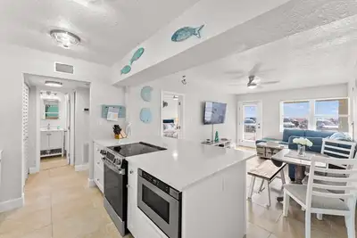 Image de Historique Pass-a-grille condo en bord de mer avec piscine St. Plage de Pete