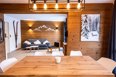 Image de Courchevel village : Appartement T4 cosy - accès skis aux pieds (ski in\/ski out)