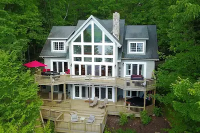 Image de Maison au bord du lac avec 5 maîtres et quai privé!