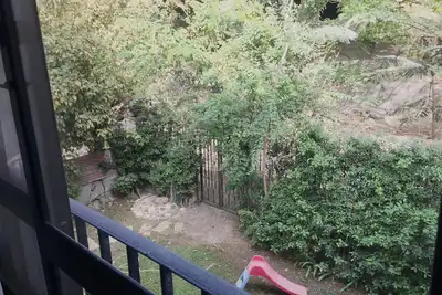 Image de vue sur le jardin fel confortable dans la rue Maadi 7