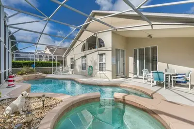 Image de Maison de 3 chambres avec piscine dans le port d'Oak Island à quelques minutes de Disney