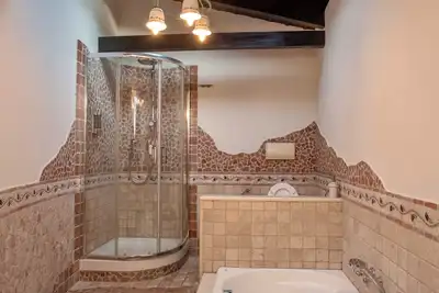 Image de Suite King avec Jacuzzi Panoramique, Terrasse, Cuisine et 2 Chambres