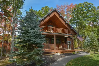 Image de Maison en rondins bien située avec bain à remous