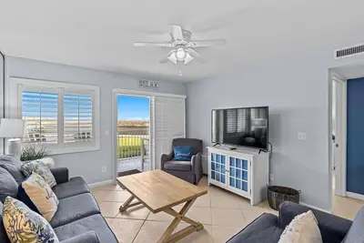 Image de Belle plage 2 chambres - 102 est l'un des rares avec laveuse / sécheuse