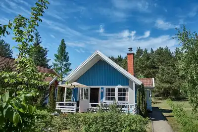 Image de Maison de vacances avec 3 chambres directement sur le Useriner See avec plage de baignade, cheminée