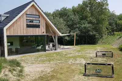 Image de Marque nouvelle villa pour 8 personnes avec sauna installé sur la plage de Ouddorp